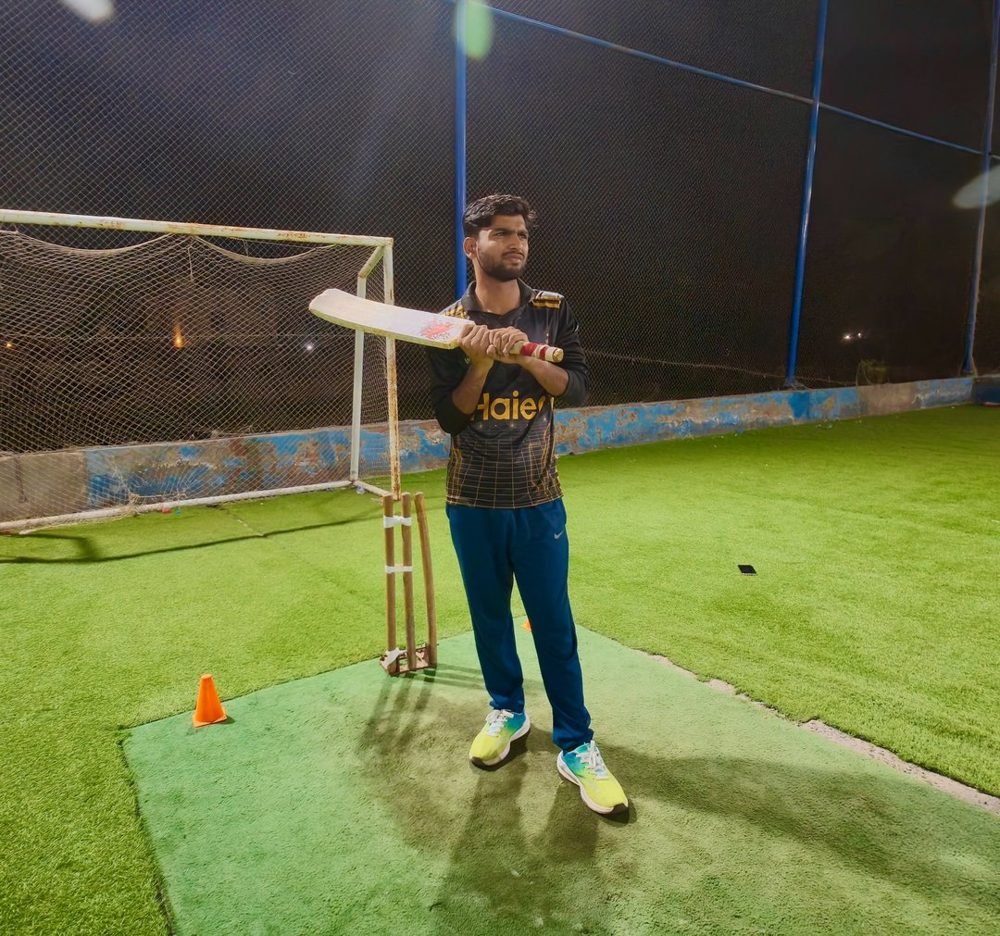 Waleed batting in practice nets at night